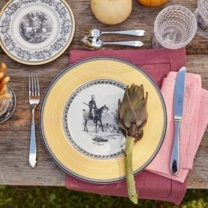 Audun Chasse Dinner Plate shown with pink linens.