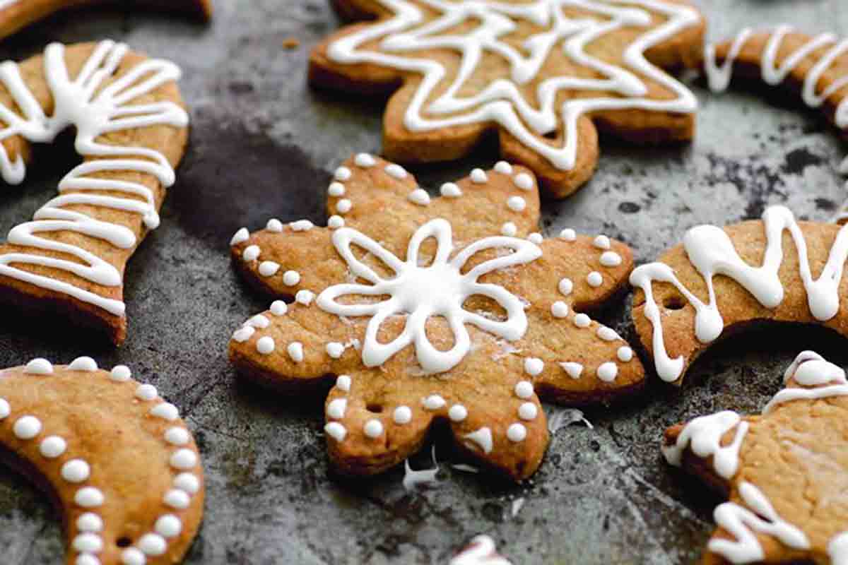 Sugar Christmas snow cookies, in various shapes, decorated with white icing.