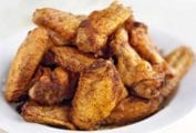 A bowl of five spice chicken wings.