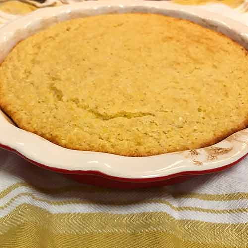 Pie pan with warm cornbread inside