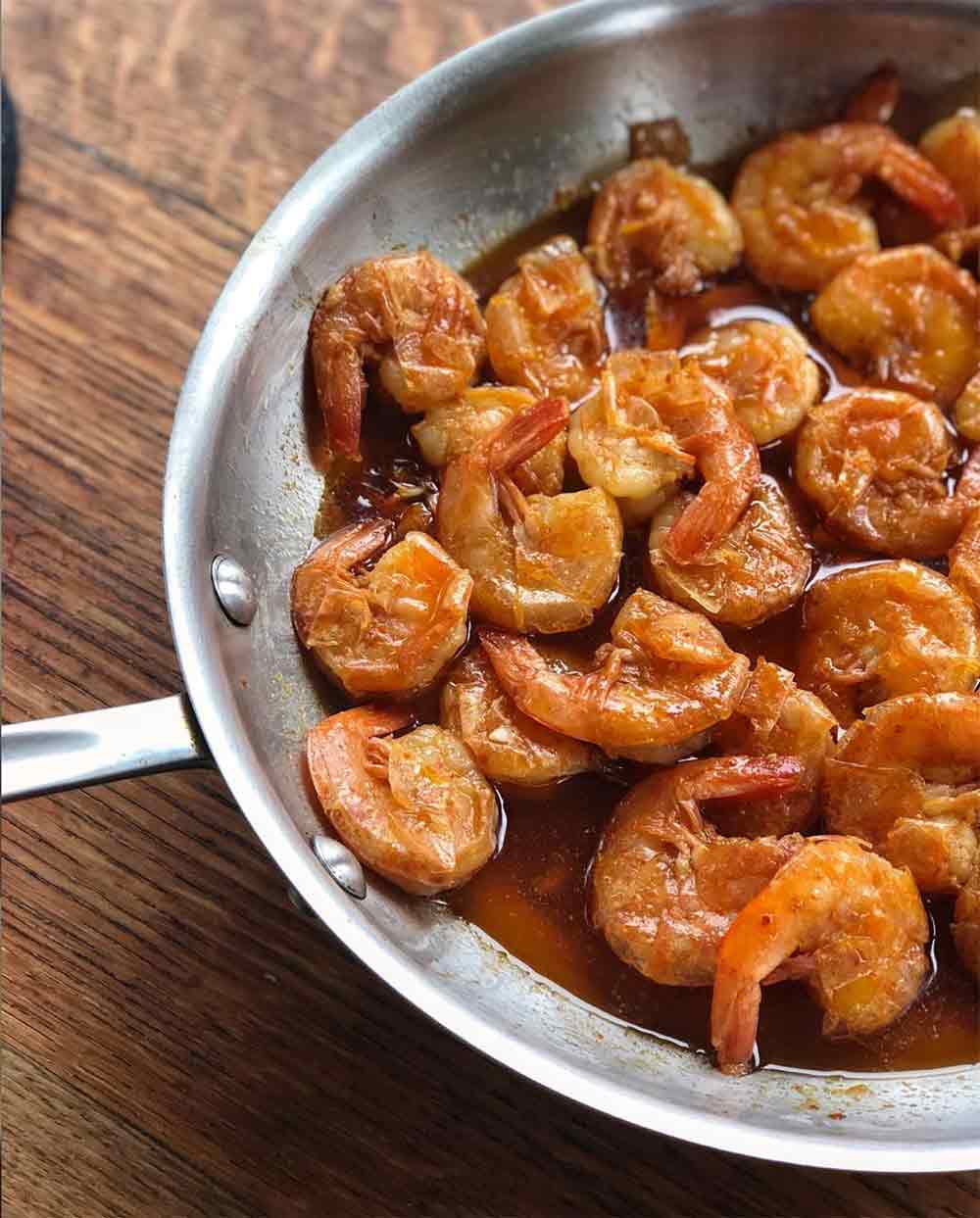 Cooked shrimp with smoked paprika in a skillet 