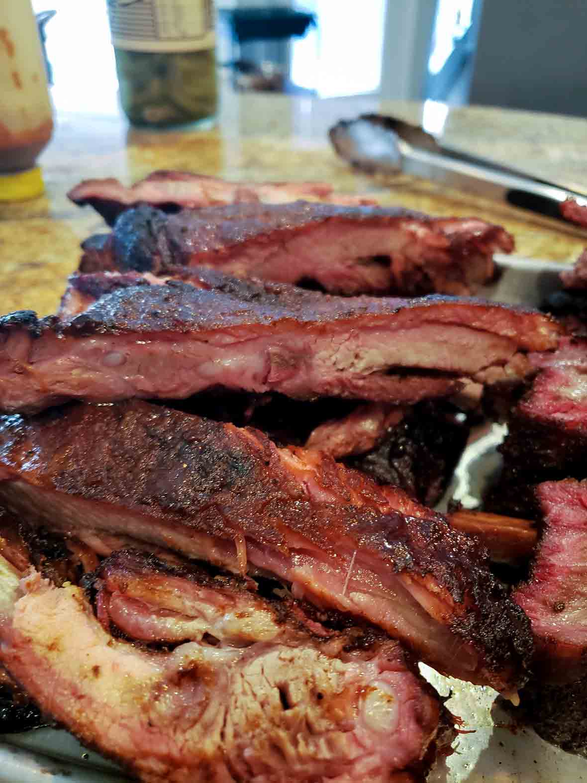 A pile of smoked pork ribs.
