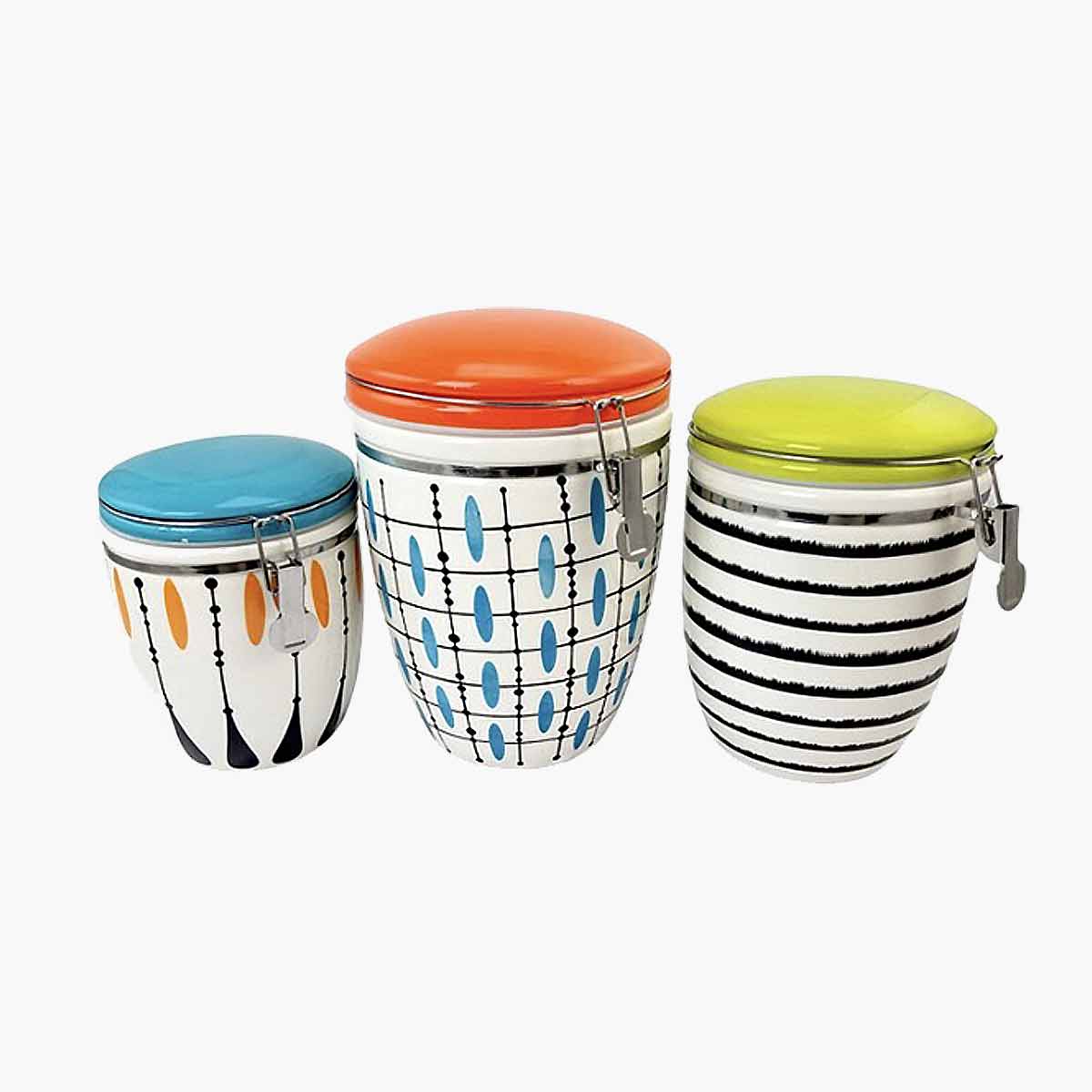 A 3 piece kitchen canister set with retro patterns.