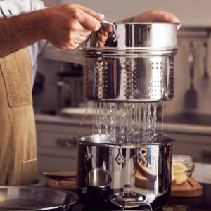 All-Clad Stainless Steel Multicooker with Inserts Draining