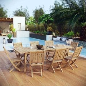 Marina Outdoor Patio Teak Dining Set by a pool.