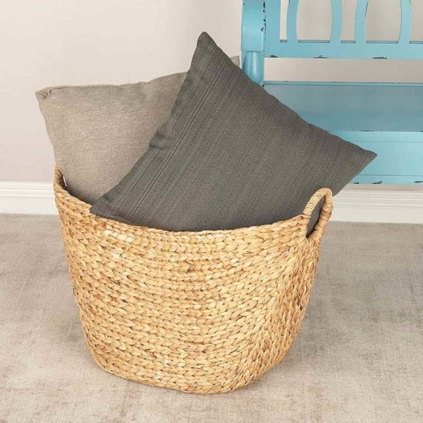 Woven Wicker Basket with Tan Pillows