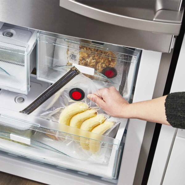 A photo of a Zwilling Fresh & Save vacuum bag in freezer with bananas.