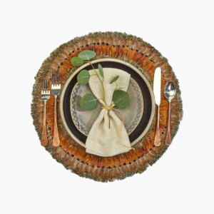 Two's Company Pheasant Placemat, Set of 6 with white napkin and greenery.