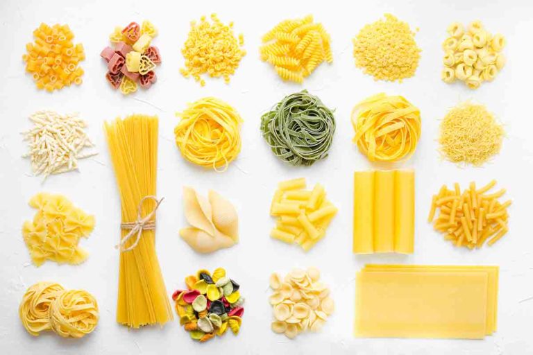 Assorted shapes of dried pasta as an illustration of how to choose the best pasta shape for your sauce.