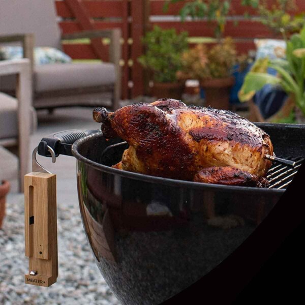 Wireless Meat Thermometer in use with grilled chicken.