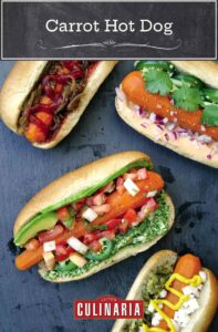 Four carrot hot dogs filled with assorted garnishes.